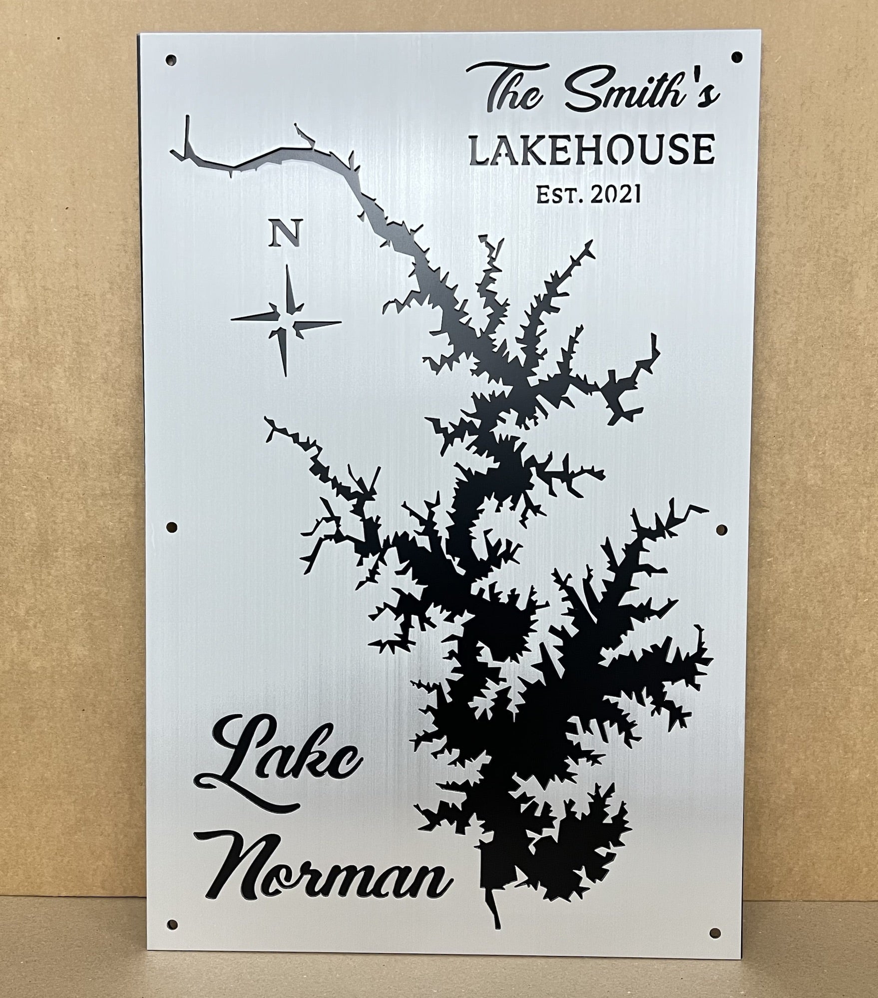 Lake Norman custom metal sign with "The Smith's Lakehouse Est. 2021" and a compass rose.