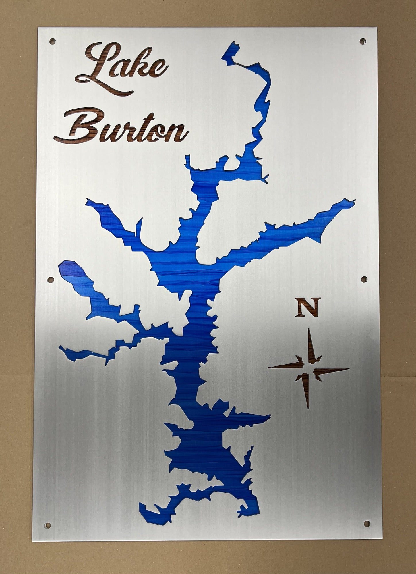 Lake Burton map cutout on brushed steel with blue inlay and compass rose.