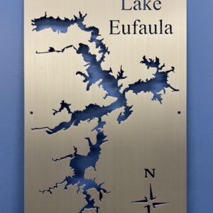 Brushed Aluminum Lake Eufaula Map with compass rose on a blue wall.