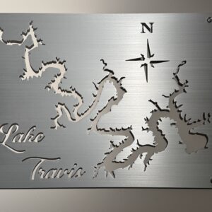 Metal wall art of Lake Travis with a compass rose and engraved text, featuring intricate lake outlines.