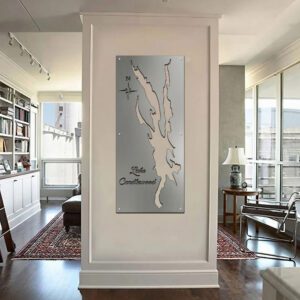 Metal map of Lake Candlewood mounted on a wall in a modern living room.