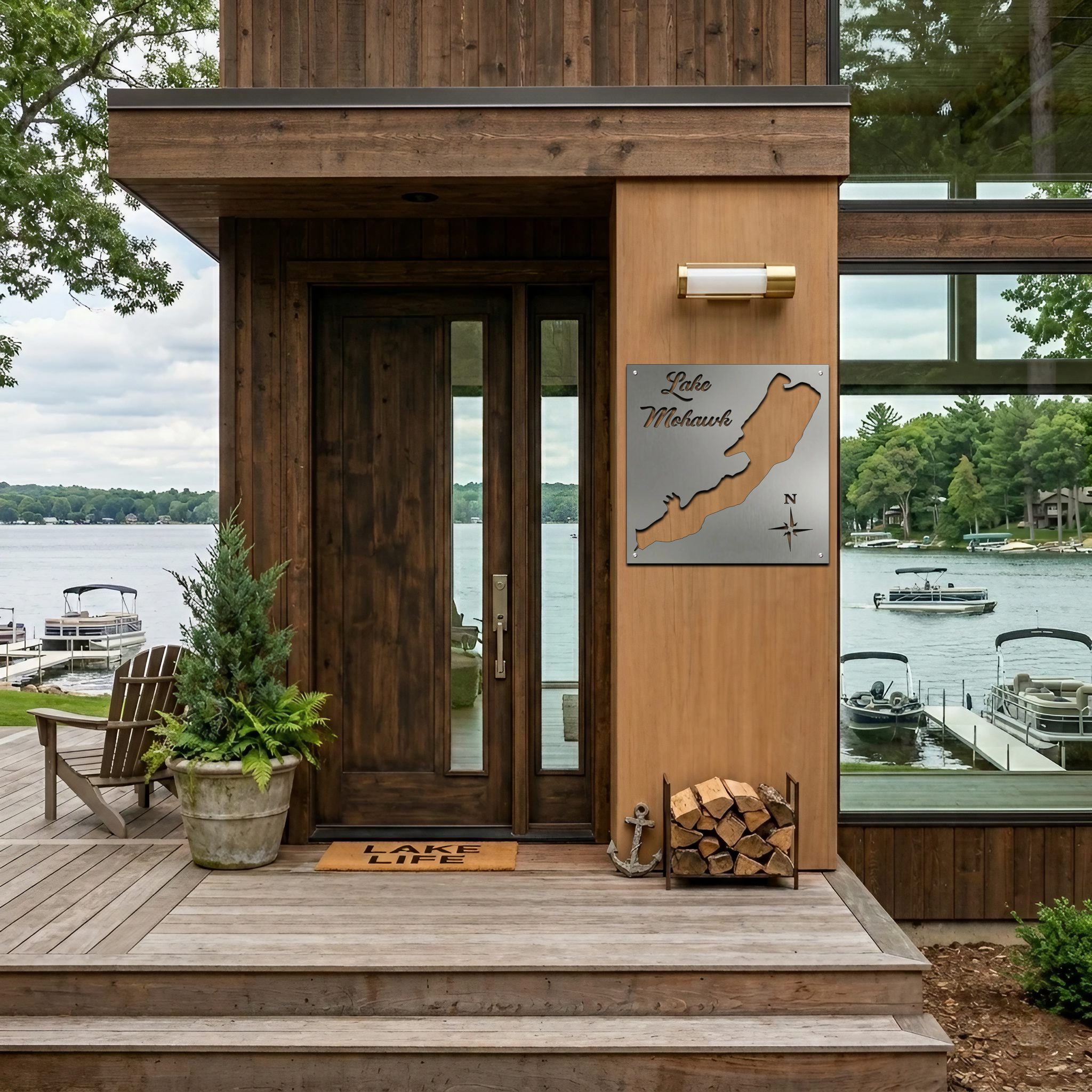Entrance to a lakeside home features a Lake Mohawk map, wooden door, and a welcome mat reading "LAKE LIFE.