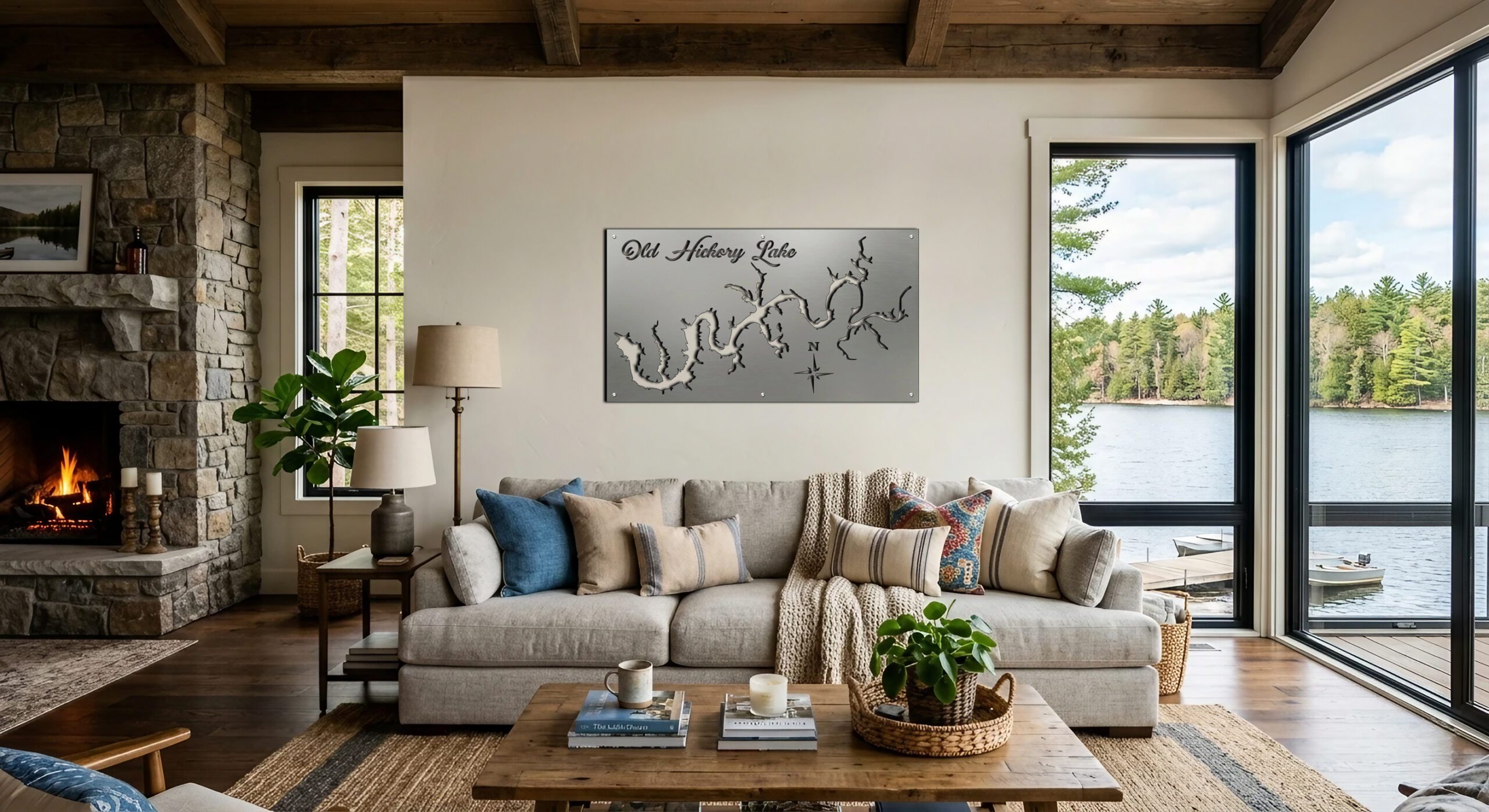A cozy living room features a metal map of Old Hickory Lake on the wall, with a view of the lake outside.