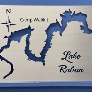 Metal map of Lake Rabun with cut-out design, labeled with "Camp Welikit" and a north arrow.