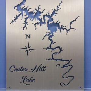 Metal sign displaying the outline of Center Hill Lake with decorative text and a compass rose.