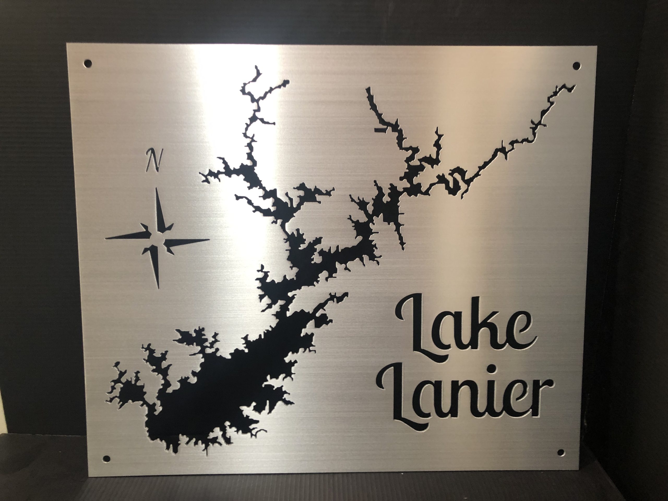 Lake Lanier brushed metal map with a dark backplate and compass rose.